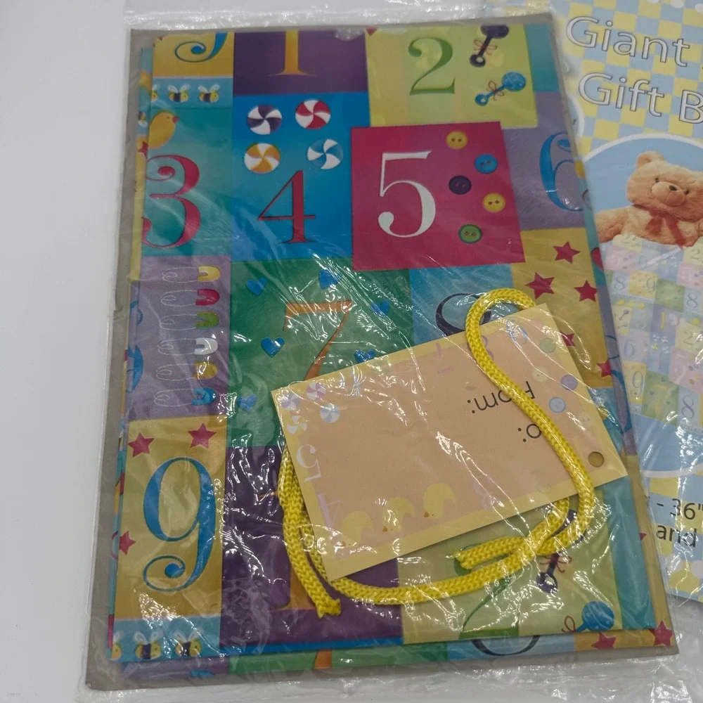 Voila 2 Pack Giant Size Baby Gift Bags 36x44 Nursery Numbers Rattles with Tags